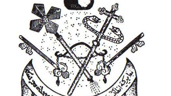 Das Bild zeigt ein Wappen mit Schwertern, Schlüsseln und arabischer Schrift.