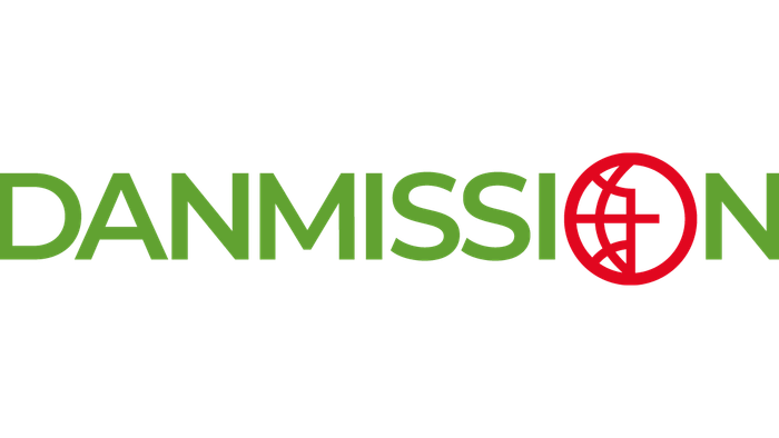 Billedet viser logoet for Danmission med ordet "DANMISSION" i grønt og en rød cirkel med et grønt kors.