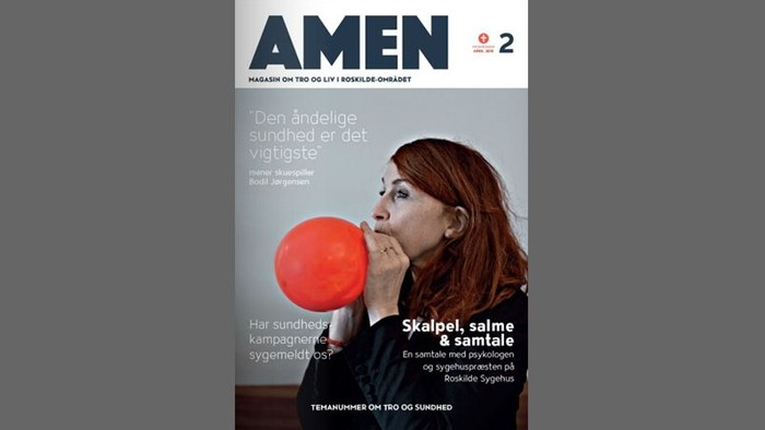 Amen-magasin med billede af kvinde og rød ballon.