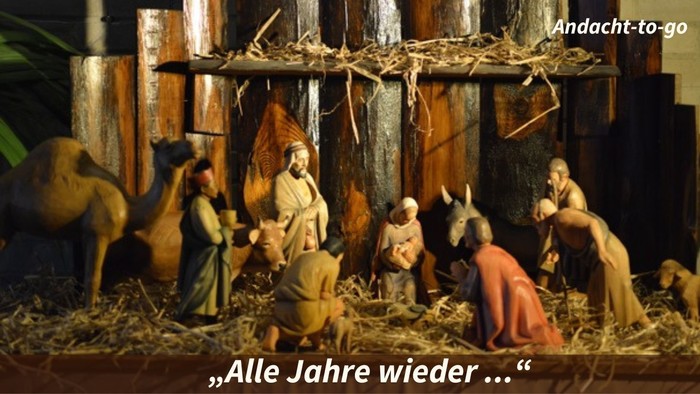 Eine Krippe mit Figuren und Tieren, "Alle Jahre wieder..."
