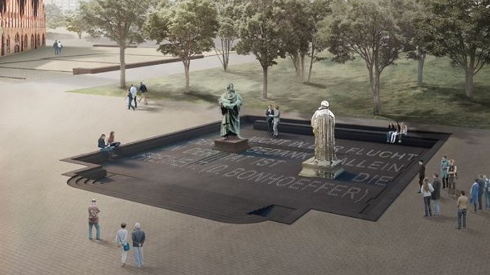 Ein Brunnen mit Statuen in einem Park, umgeben von Menschen.