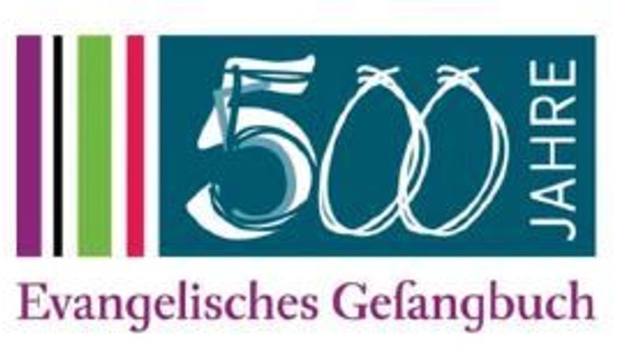 Das Bild zeigt ein Logo zum 500-jährigen Jubiläum des *Evangelischen Gesangbuchs*.