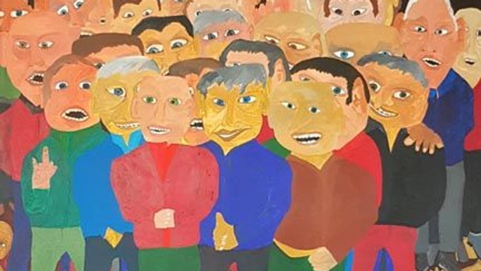 Menschenmenge, die Flaggen und Schilder hält