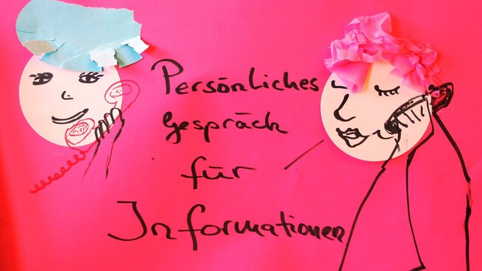 Zwei Cartoonfiguren mit Text