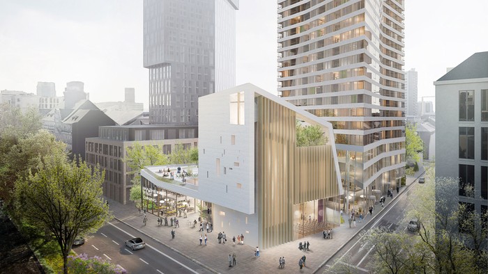 Zwei moderne Wolkenkratzer in belebter Stadtmitte mit klarem Himmel
