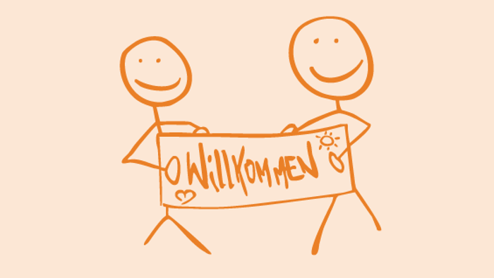 Zwei glückliche Figuren halten ein Schild mit der Aufschrift 