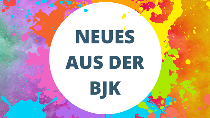 Bunter Farbklecks mit weißem Kreis und
