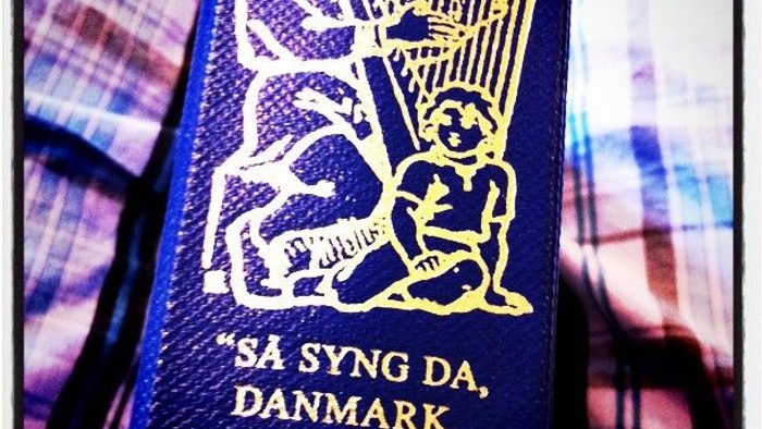 Danske pas med mottoet 