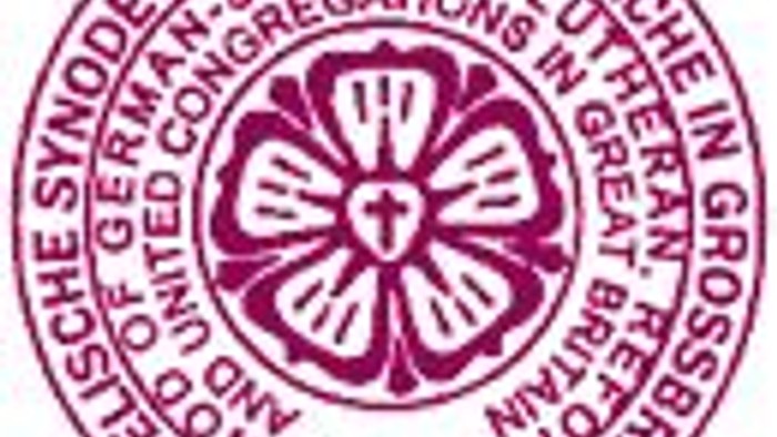 Das Siegel zeigt ein stilisiertes Blumenmuster mit Text in einem Kreis.