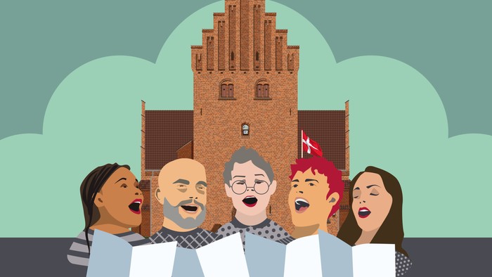 En gruppe af mennesker synger i en børnekor i forlandet af en borg.