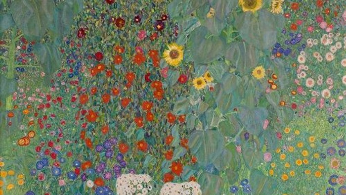 Ein leuchtender Blumenstrauß mit Sonnenblumen und bunten Blumen auf einem grünen Hintergrund