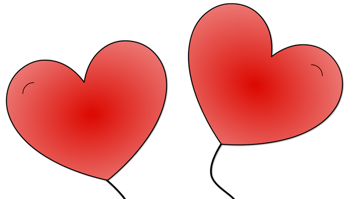 To hjerter på sort baggrund