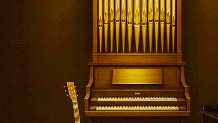 Ein Piano mit einem Gitarrenkörper lehnt an der Wand