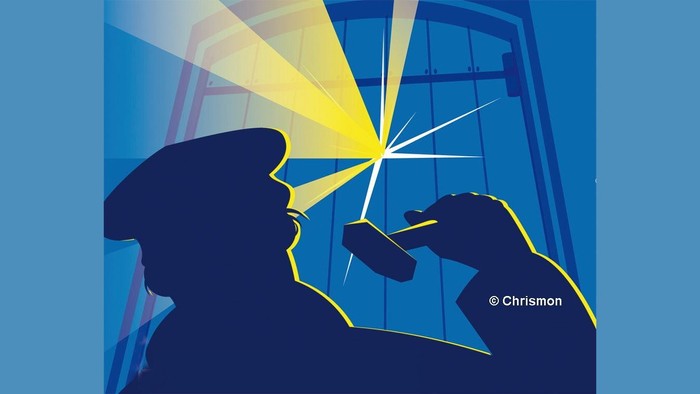 Die Silhouette einer Person mit einem Lichtstrahl, der eine Karte von Deutschland beleuchtet