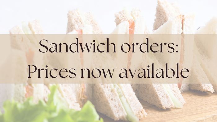 Sandwiches lined up on a table with text overlay: