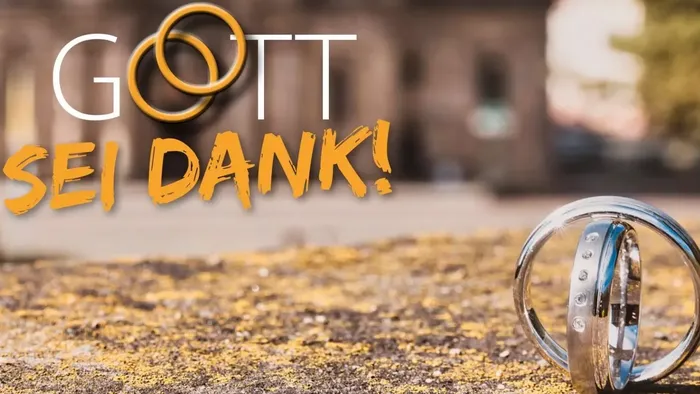 Eheringe mit dem Schriftzug Gott sei Dank