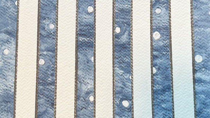 Rustne metalstænger med cirkulære huller, der viser tegn på slid og alder.