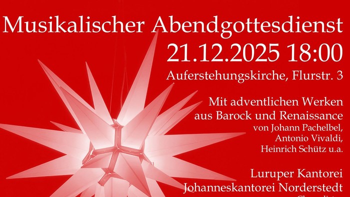 Herrenhuter Stern der Auferstehungskirche vor rot gefärbtem Hintergrund