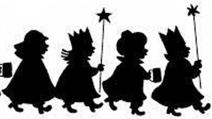 Silhouetten von Kindern in Kleidern und Kronen, einige halten Sterne, die in einer Reihe stehen.