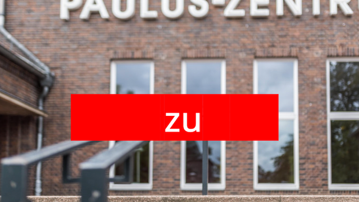 Rotes Schild mit der Aufschrift **