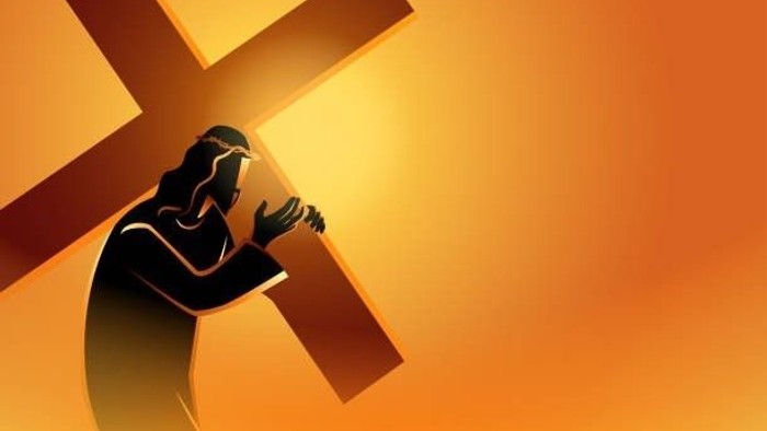 Eine Silhouette eines Mannes mit einem Kreuz auf einem orangefarbenen Hintergrund.