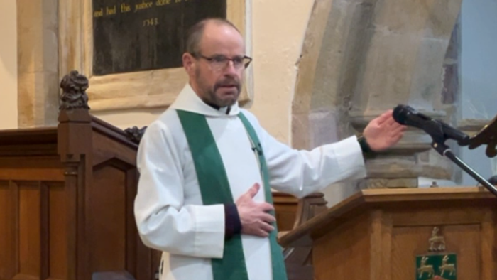 Rev Simon preaching at St Mary's