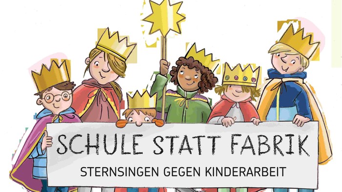 Kinder, verkleidet als Könige, halten ein Banner mit der Aufschrift *„Schule Statt Fabrik“* (Schule statt Fabrik).