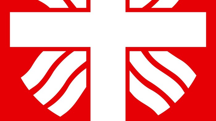 Das Logo von Caritas mit einem roten Kreuz und dem Wort 