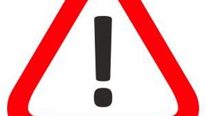 Achtungssymbol in Rot mit Ausrufezeichen in der Mitte