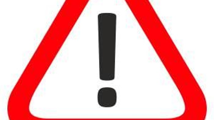 Achtungssymbol in Rot mit Ausrufezeichen in der Mitte