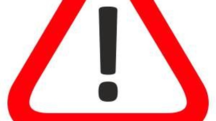 Achtungssymbol in Rot mit Ausrufezeichen in der Mitte