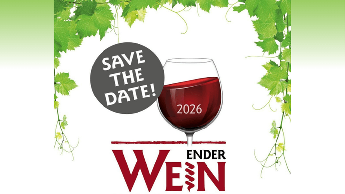 Weinblätter rahmen ein Weinglas mit der Aufschrift