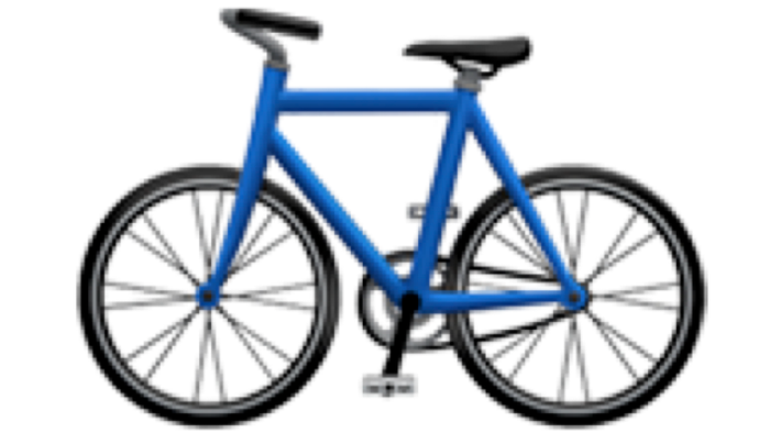 Ein blaues Fahrrad und eine grüne Straßenbahn