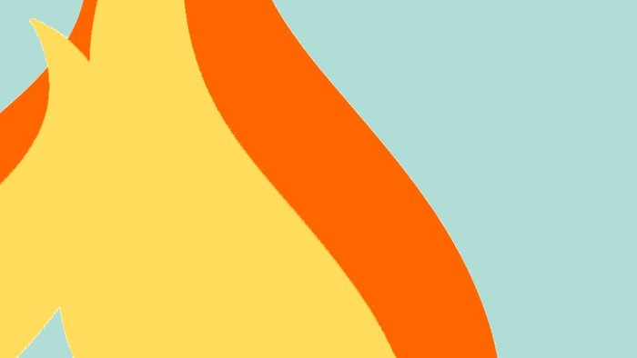 Ein leuchtendes orangefarbenes Flammenbild vor einem hellblauen Hintergrund