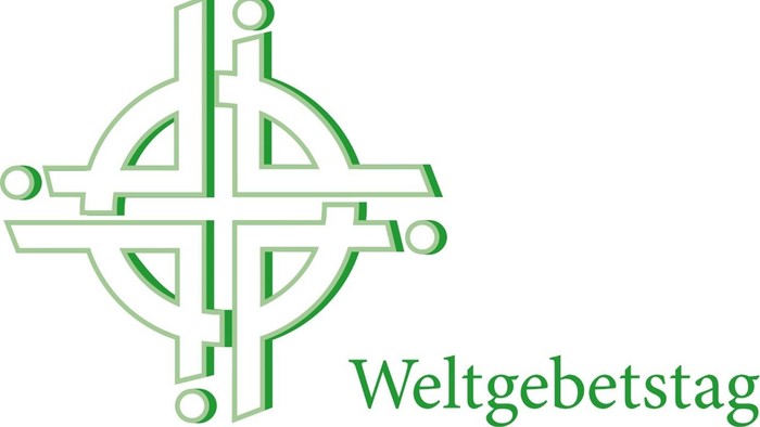 Das Bild zeigt ein grünes Kreuz mit dem Text „Weltgebetstag“.