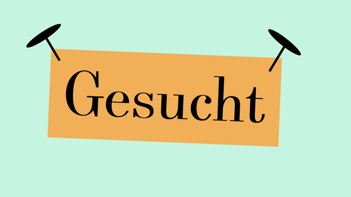 Ein orangefarbenes Banner mit der Aufschrift 
