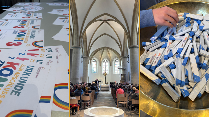 Man sieht einen Tisch mit Urkunden, eine gut besetzte Christuskirche vom Taufbecken aus gesehen und eine große Schale mit Schokolanderiegeln.