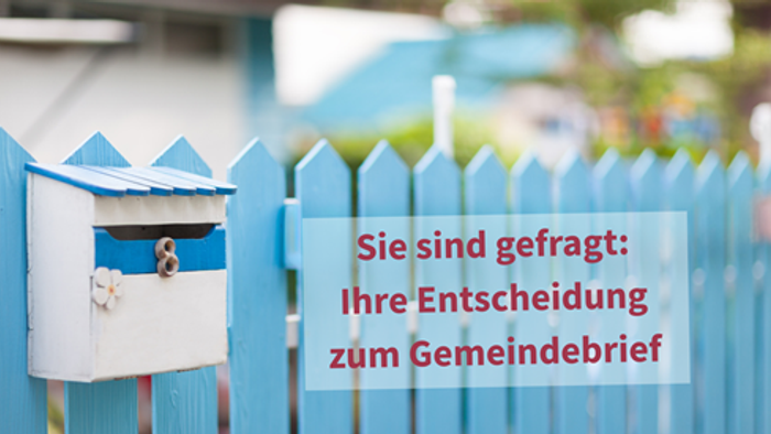Briefkasten am Zaun - Titelbild Abfrage zum weiteren Erhalt des Gemeindemagazin