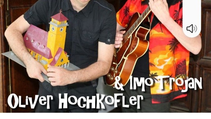 Plakatwerbung für ein humorvolles Konzert von Oliver Hochkofler und Imo Trojan bei einer Kirchenveranstaltung am 2. Oktober 2026.