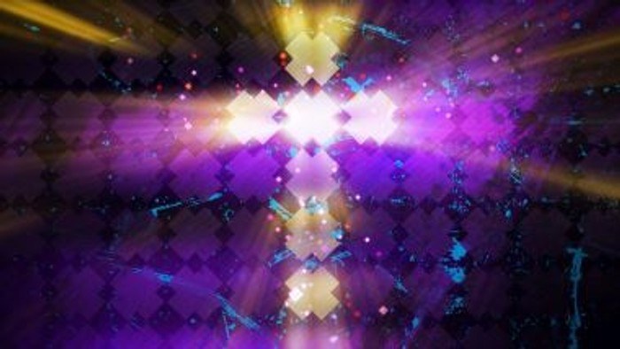 Vibrant, abstract image with bright light and colorful particles.
