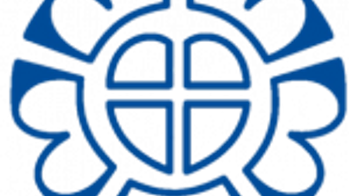 Ein stilisiertes blau-weißes Logo mit miteinander verbundenen kreisförmigen und kreuzförmigen Elementen, das Einheit und globale Verbindung symbolisiert.