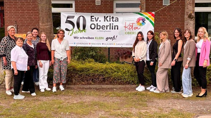 Ein Teamfoto mit Kita-Mitarbeitende