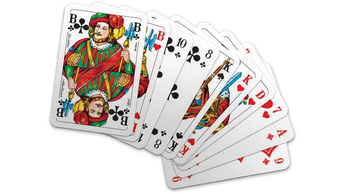 Ein Fan von bunten Spielkarten mit nummerierten Karten und traditionellen Hofkarten vor einem dunklen Hintergrund.