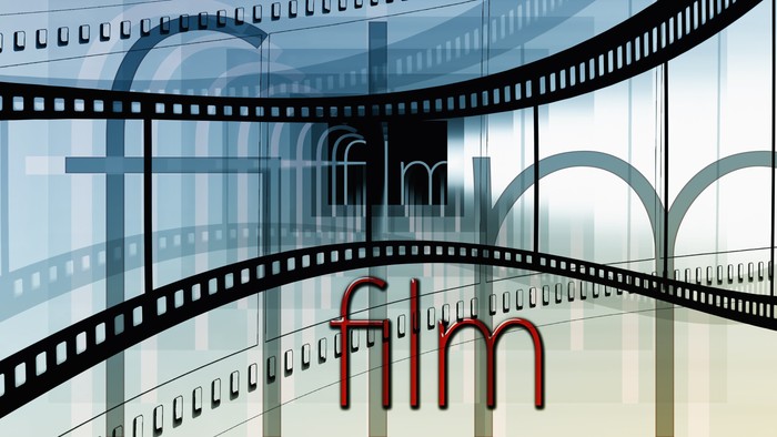 En stiliseret filmrulle med ordet 
