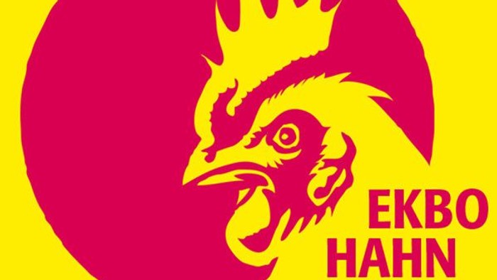 Das Bild zeigt ein Hahnenkamm-Symbol mit dem Text