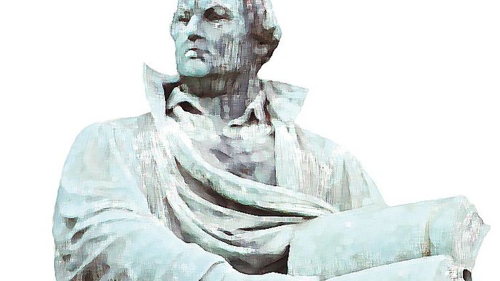 Die Statue eines Mannes in sitzender Position, der ein Buch hält