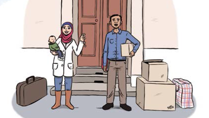 Familie vor Tür mit Umzugskartons