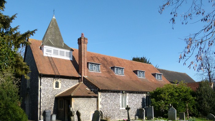 Church with old gravestones in front.