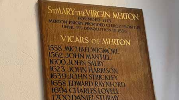 A plaque lists vicars of St. Mary the Virgin, Merion, from 1558 to 1712.