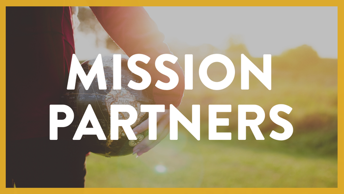 Hand holding a flag with text 